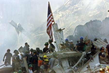 Rescue workers try to save lives after the 9/11 attack on the World Trade Center